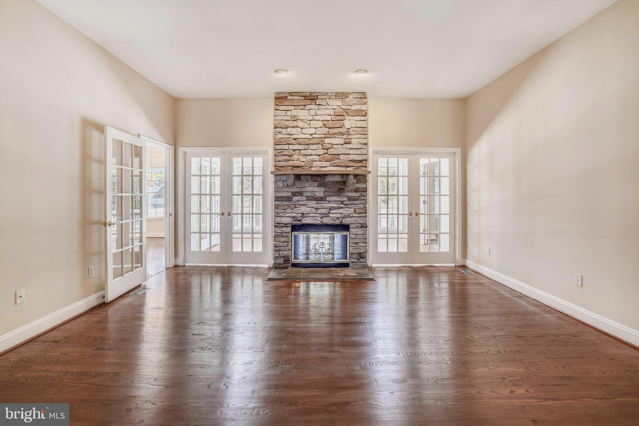 11862 Simpson Road Clarksville, MD 21029 - Photo 8 of 58 Inviting LR with floor to ceiling stone fireplace
