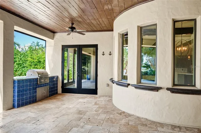 a bathroom with a double vanity sink a mirror and a bathtub