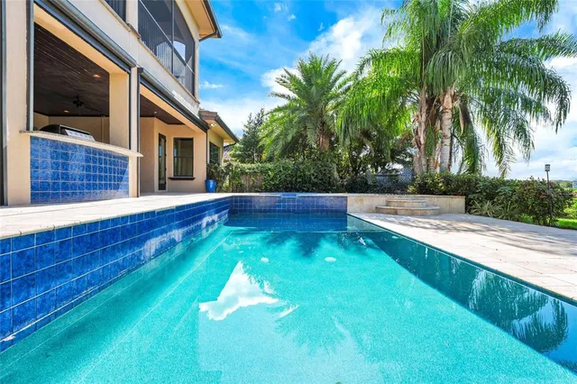 a view of a porch with a ceiling fan