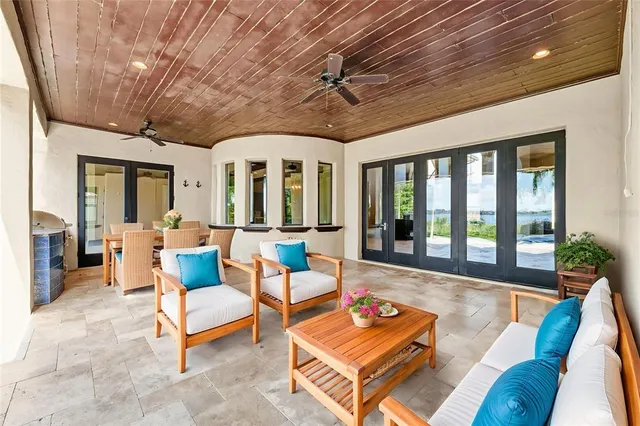 a view of a swimming pool with a yard