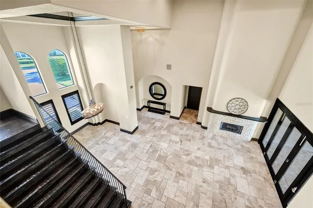a large pool table with chairs