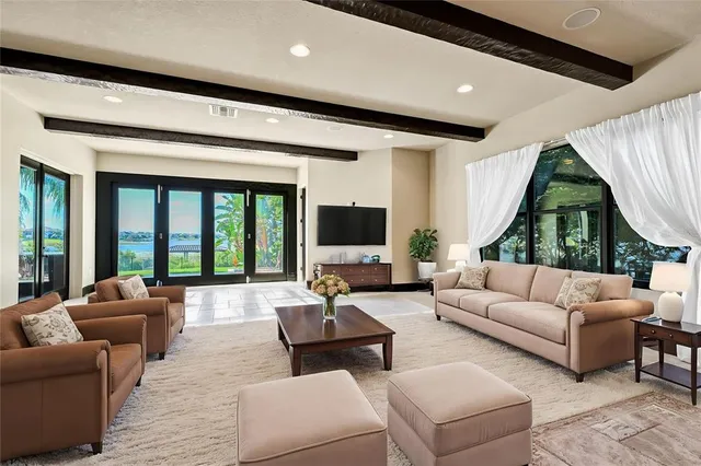 a large kitchen with stainless steel appliances kitchen island granite countertop a sink and cabinets