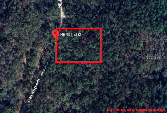 a sign that is sitting on a wooden floor