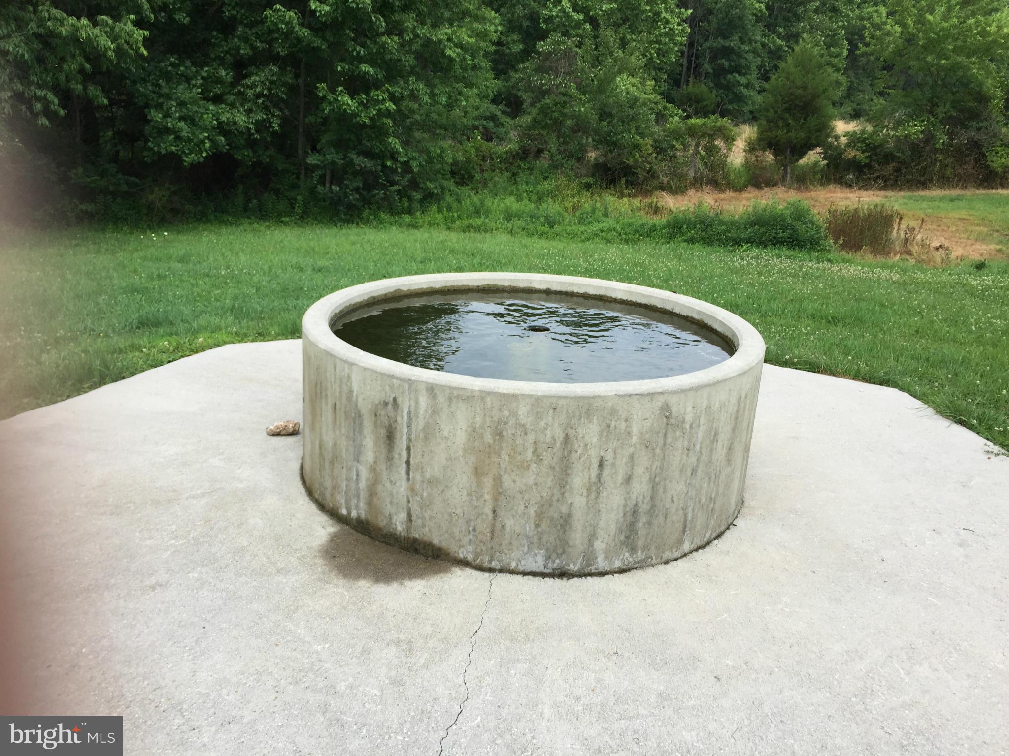 13390 Jesse Smith Road Mount Airy, MD 21771 - Photo 20 of 25 a view of a swimming pool with a yard