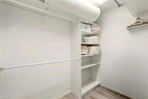 a view of an empty walk in closet