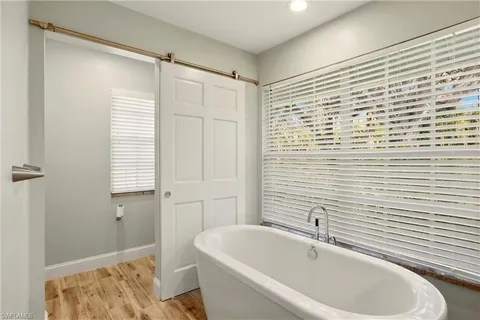 a bathroom with a sink and a bathtub