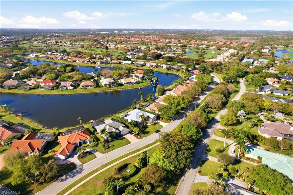 4282 Longshore Way North Naples, FL 34119 - Photo 42 of 43 Aerial view of residential area with a large body of water