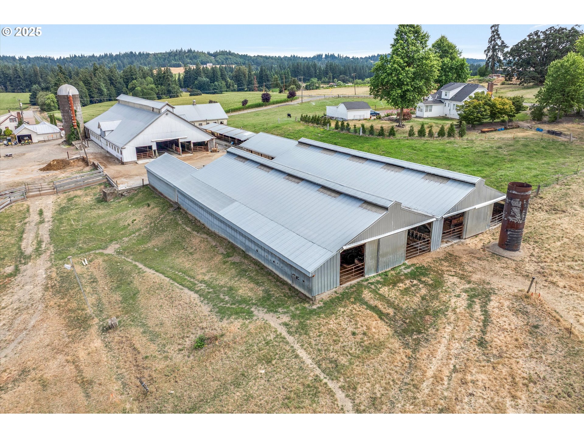 21303 South Central Point Road Oregon City, OR 97045 - Photo 22 of 48 a aerial view of a house with a yard and lake view