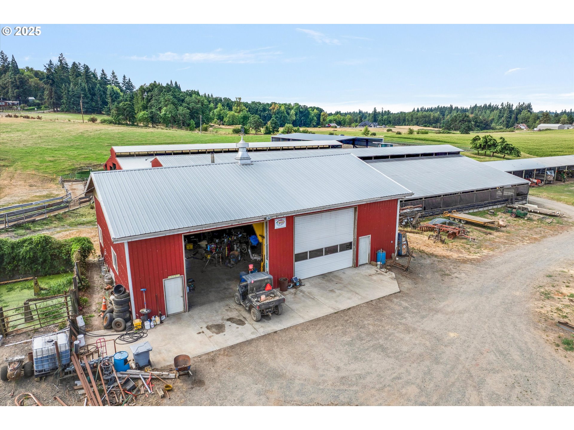 21303 South Central Point Road Oregon City, OR 97045 - Photo 27 of 48 a view of a swimming pool and trees in the background