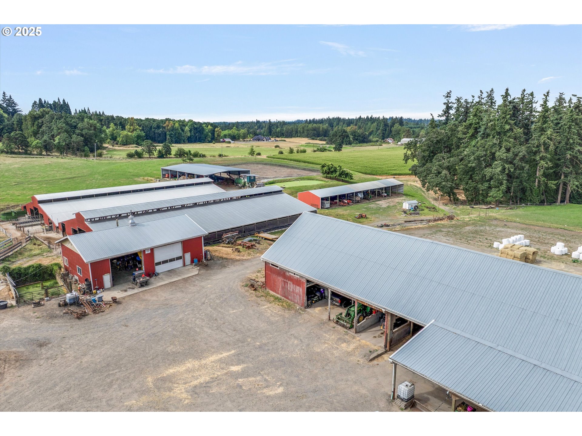 21303 South Central Point Road Oregon City, OR 97045 - Photo 28 of 48 a view of a patio with a table and chairs