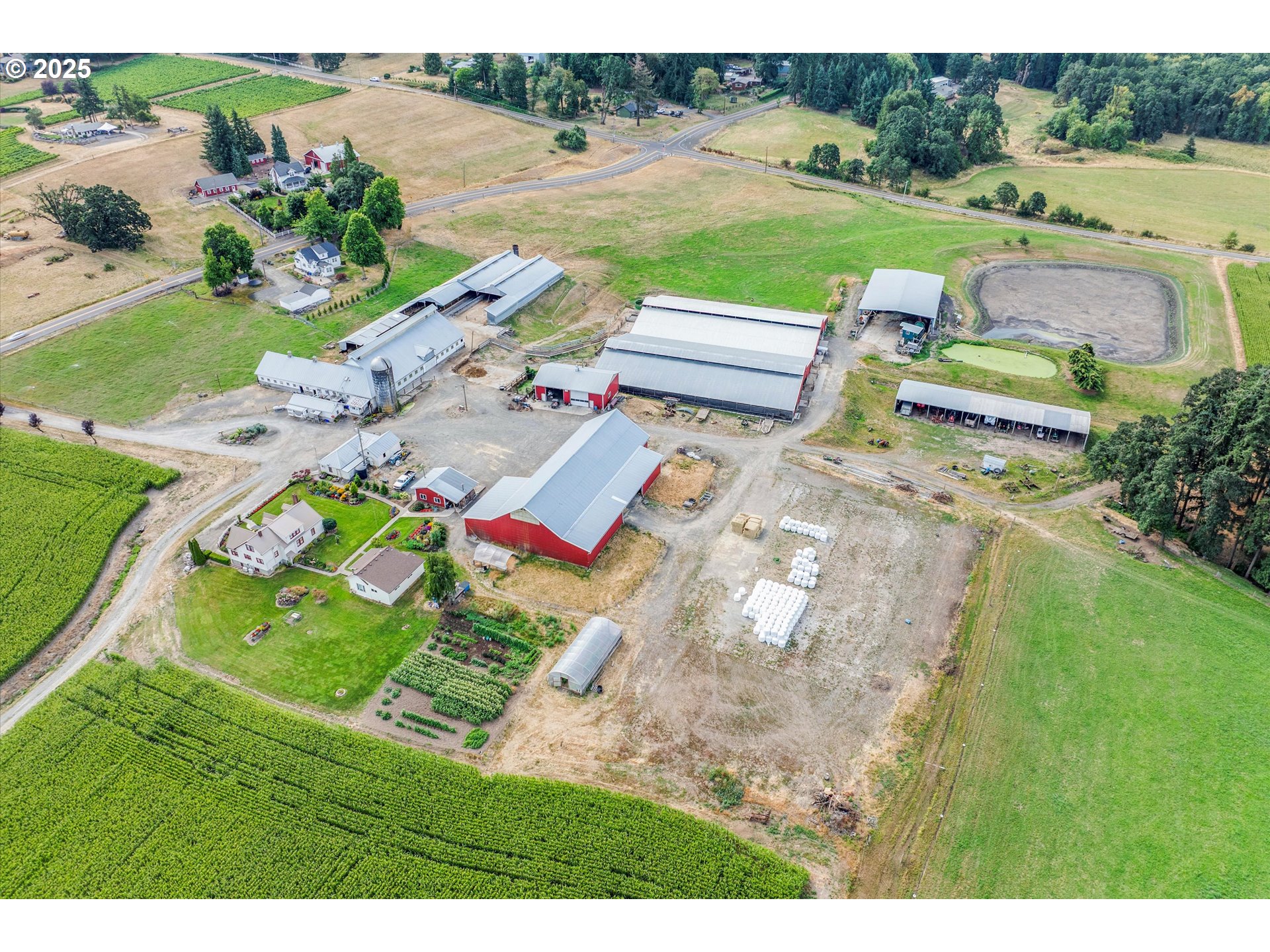 21303 South Central Point Road Oregon City, OR 97045 - Photo 4 of 48 an aerial view of a house with big yard