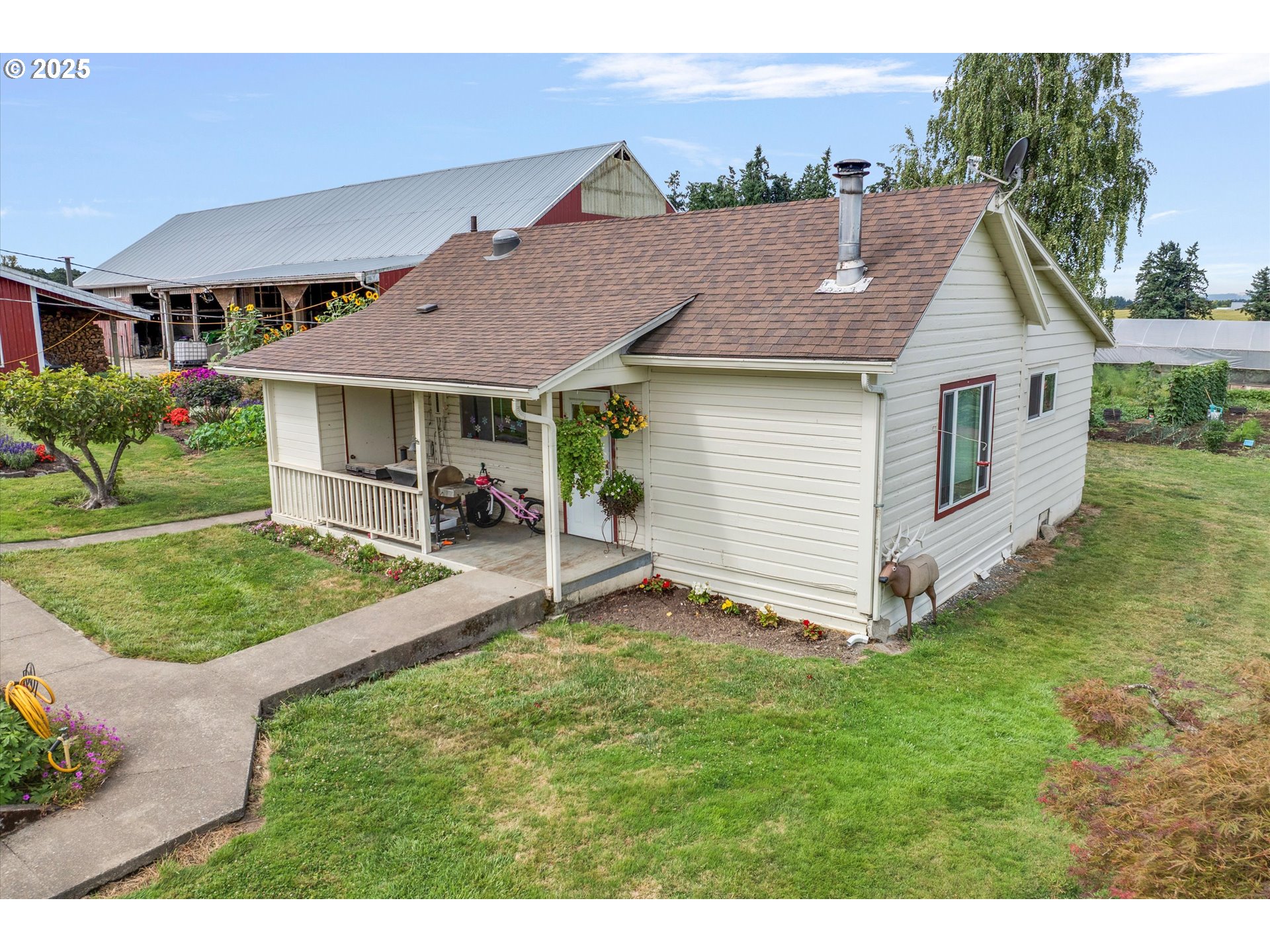 21303 South Central Point Road Oregon City, OR 97045 - Photo 47 of 48 a aerial view of a house with a yard porch and sitting area