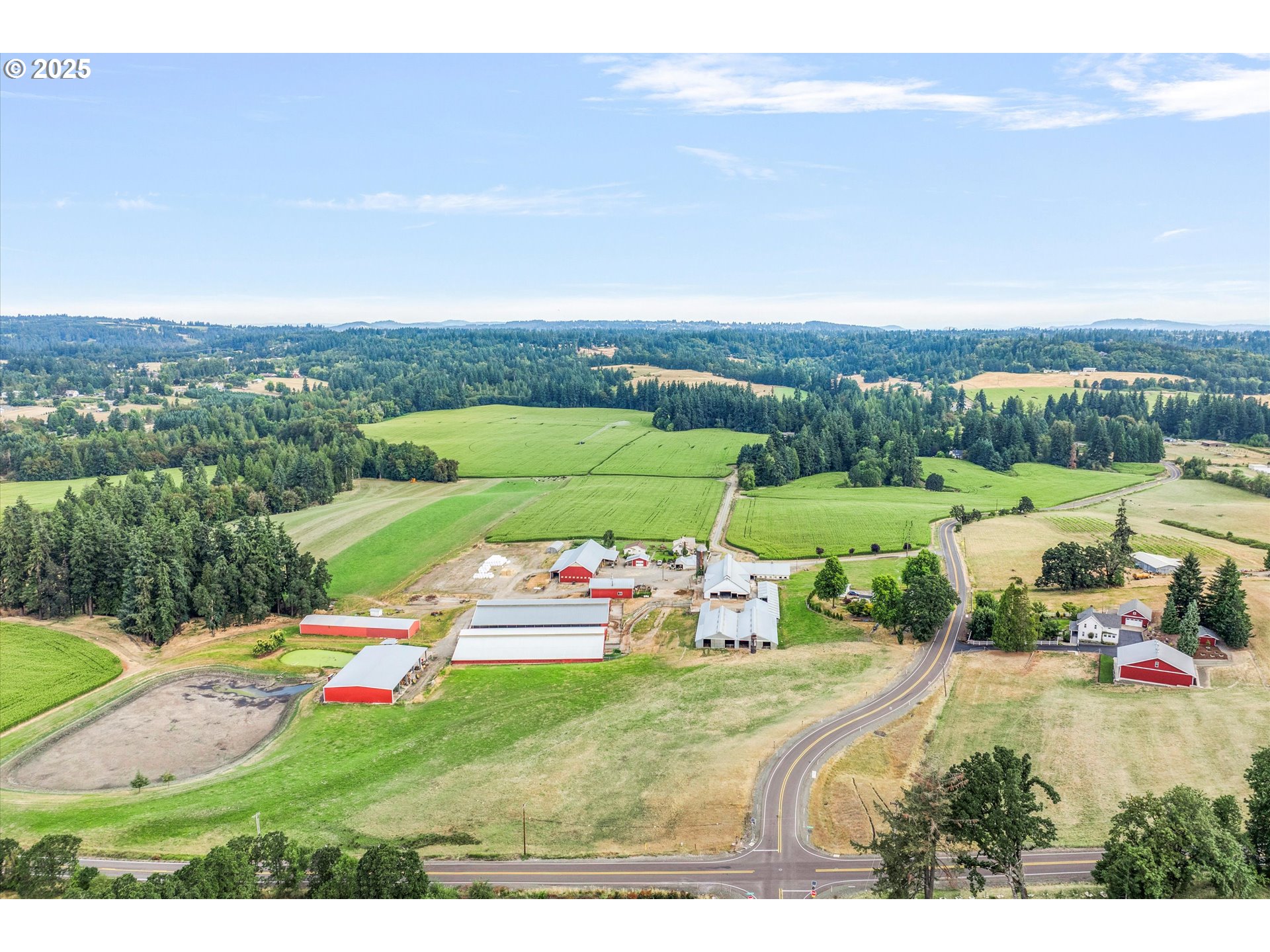 21303 South Central Point Road Oregon City, OR 97045 - Photo 5 of 48 a view of a table and chairs in the garden