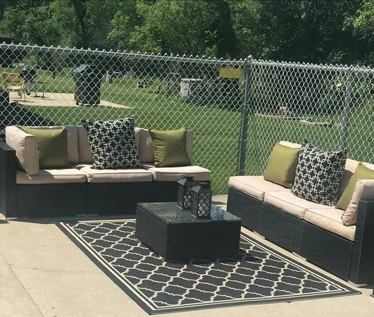 a backyard of a house with seating space