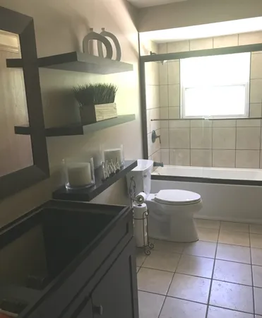a bathroom with a sink and a bathtub