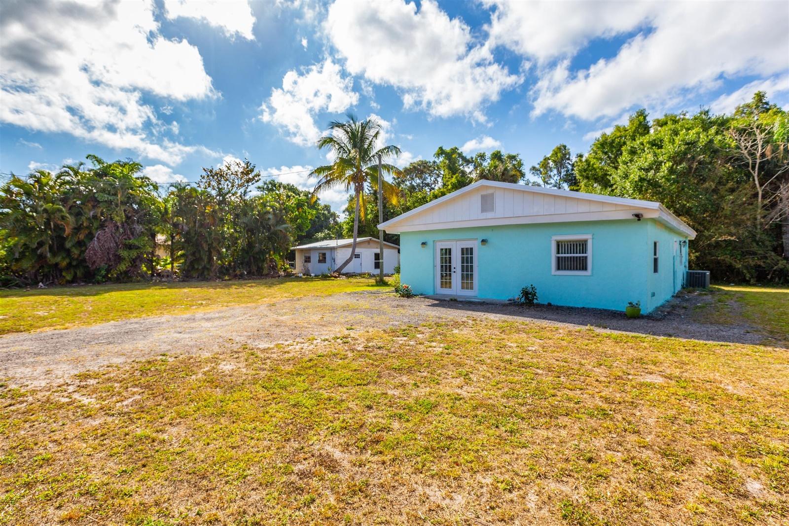 433 East Weatherbee Road Fort Pierce, FL 34982 - Photo 1 of 22 02-Outside-2