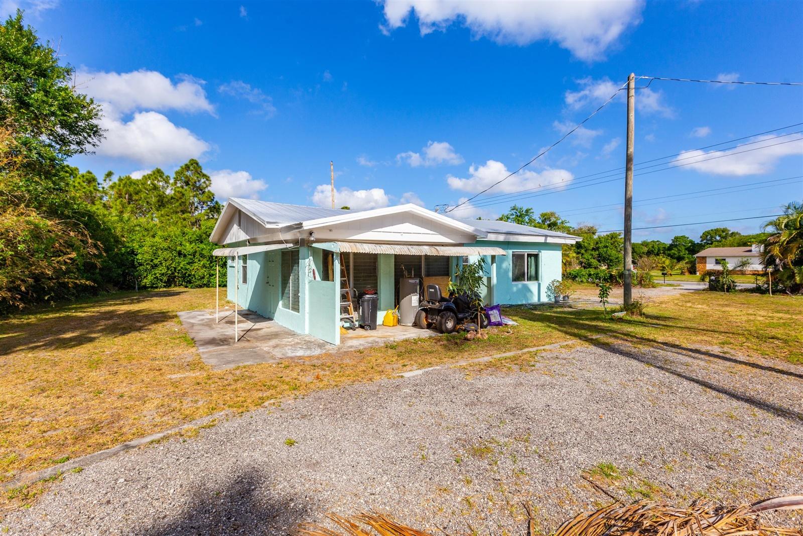 433 East Weatherbee Road Fort Pierce, FL 34982 - Photo 2 of 22 04-Outside-7