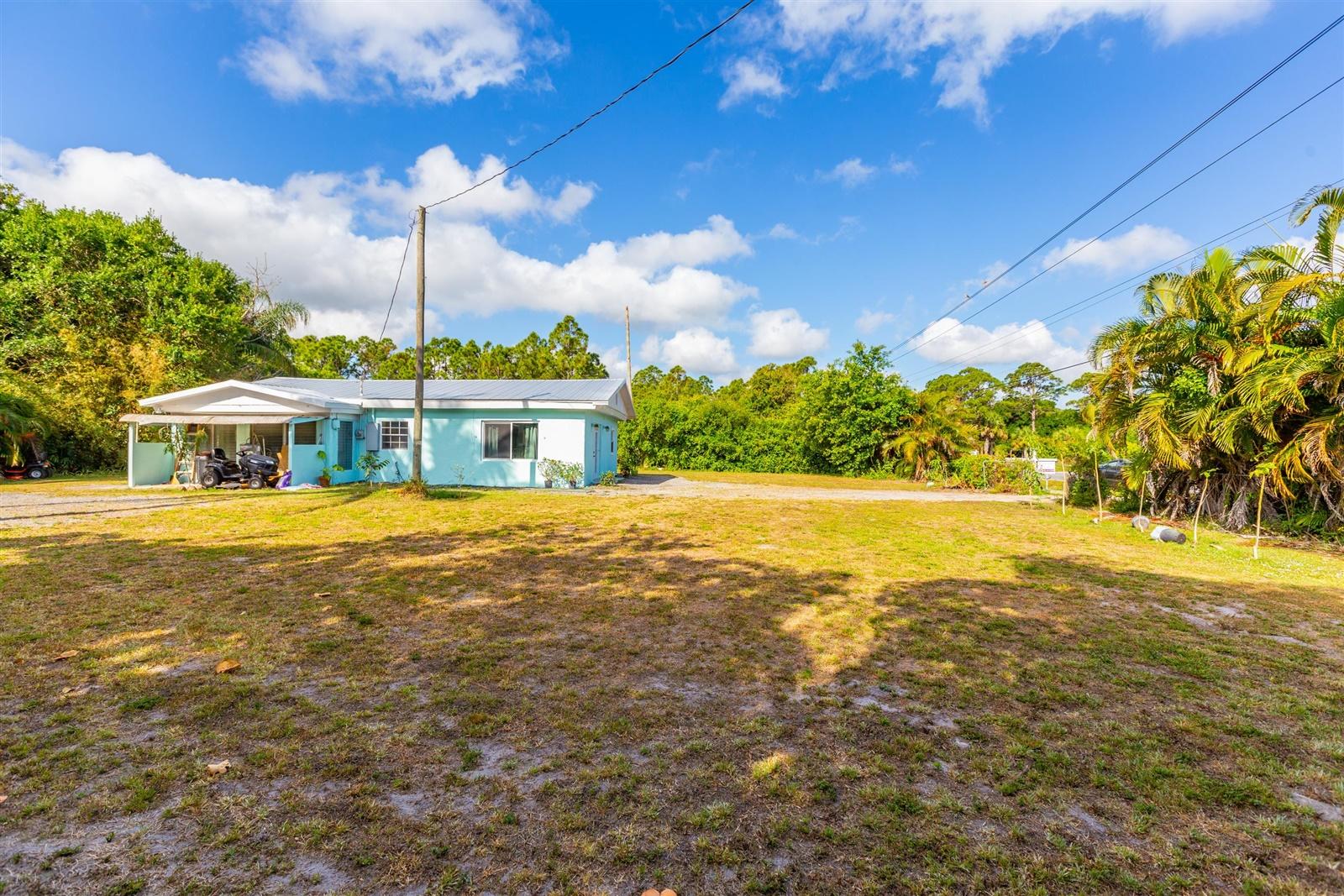 433 East Weatherbee Road Fort Pierce, FL 34982 - Photo 4 of 22 03-Outside-4