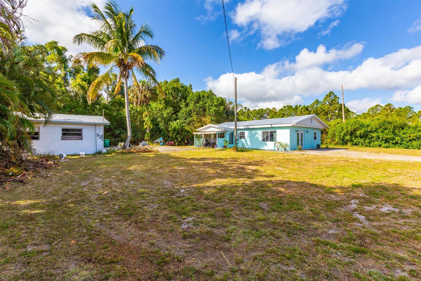 433 East Weatherbee Road Fort Pierce, FL 34982 - Photo 5 of 22 06-Outside-3