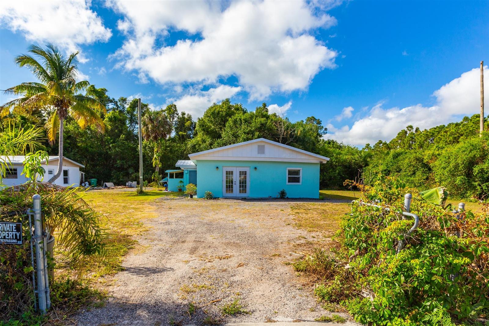 433 East Weatherbee Road Fort Pierce, FL 34982 - Photo 6 of 22 01-Outside-1