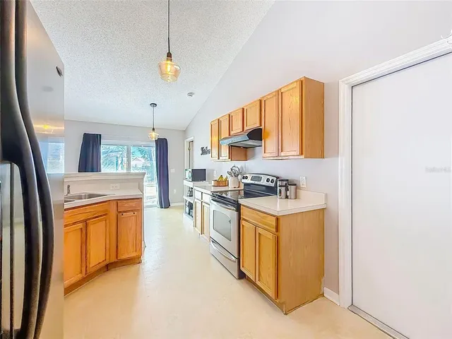 a bedroom with a bed and a mirror