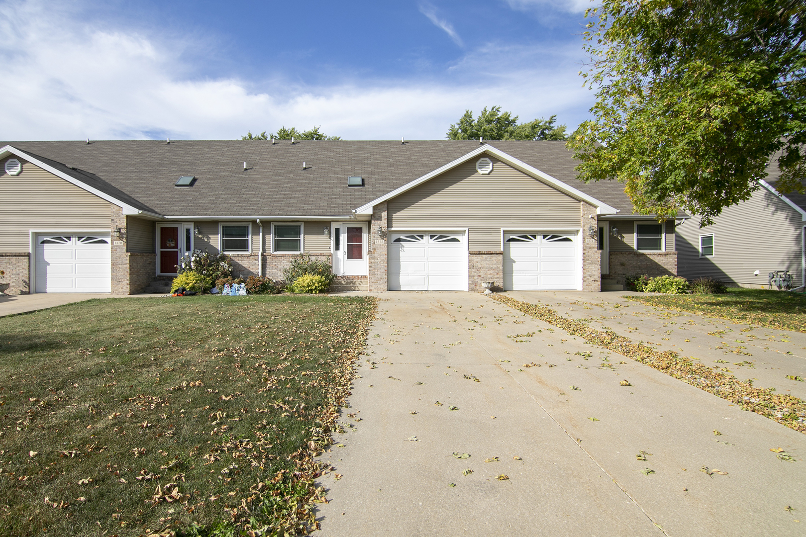 1372 Armour Road, Unit 1372 Bourbonnais, IL 60914 - Photo 1 of 15 a front view of a house with a garden