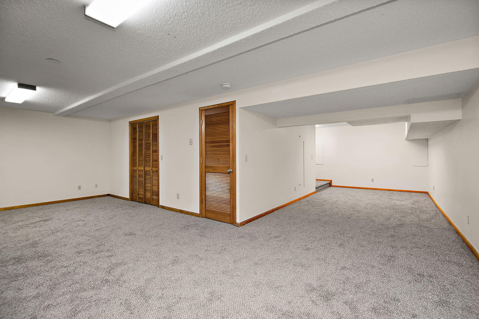 1372 Armour Road, Unit 1372 Bourbonnais, IL 60914 - Photo 12 of 15 a view of an empty room with closet and a window