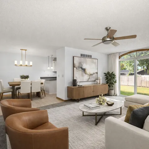 a view of kitchen with granite countertop lots of counter top space
