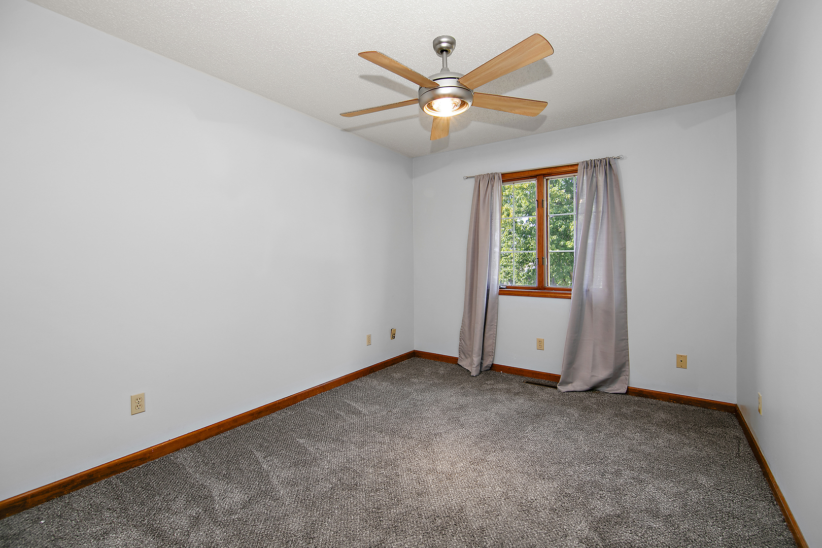 1372 Armour Road, Unit 1372 Bourbonnais, IL 60914 - Photo 9 of 15 an empty room with a window