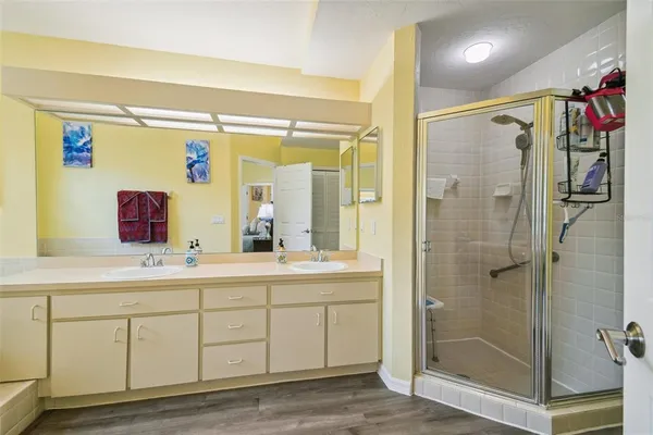 a bathroom with a shower and a toilet
