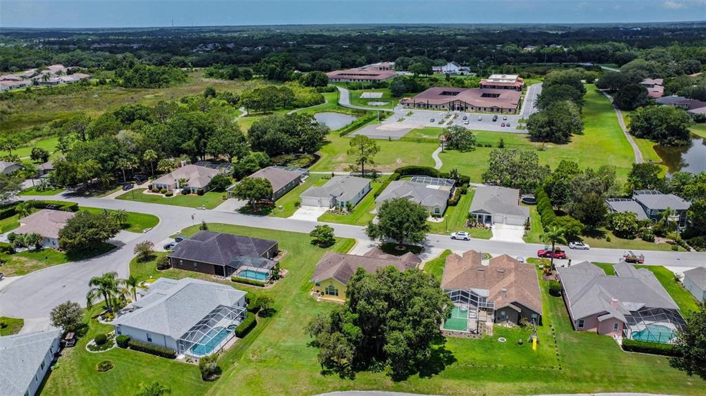 12728 Flamingo Parkway Spring Hill, FL 34610 - Photo 49 of 54 an aerial view of a house with a garden