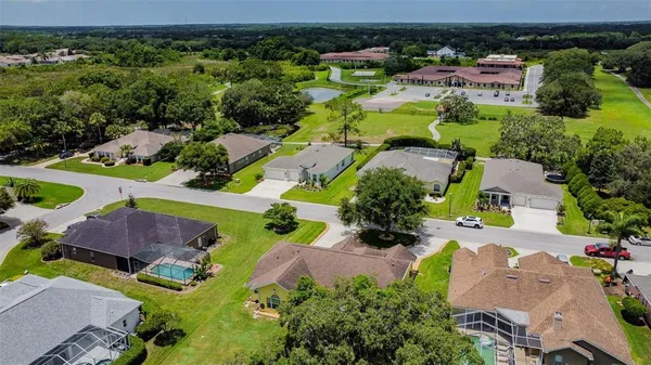 an aerial view of a house with a garden