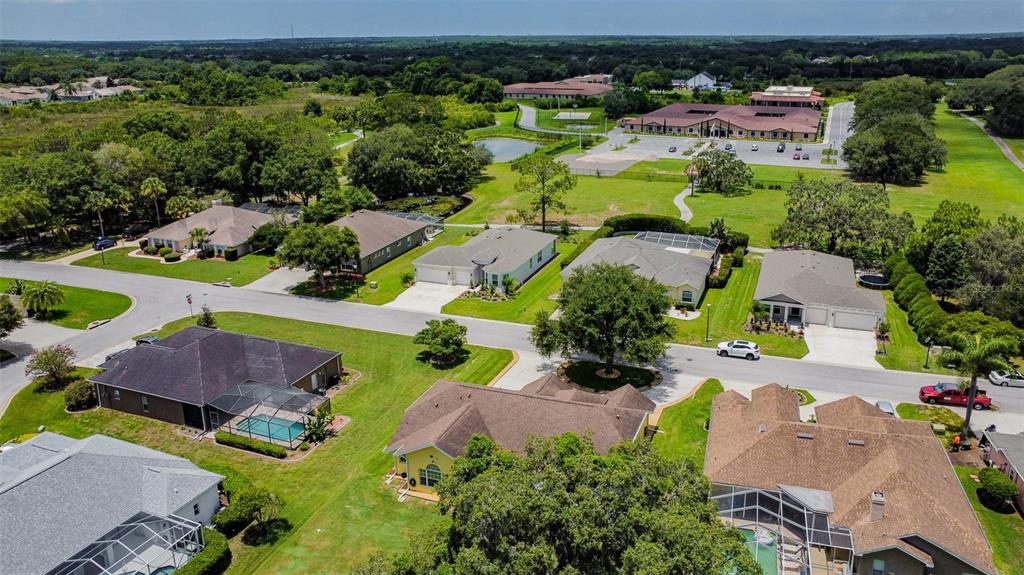 12728 Flamingo Parkway Spring Hill, FL 34610 - Photo 50 of 54 an aerial view of a house with a garden