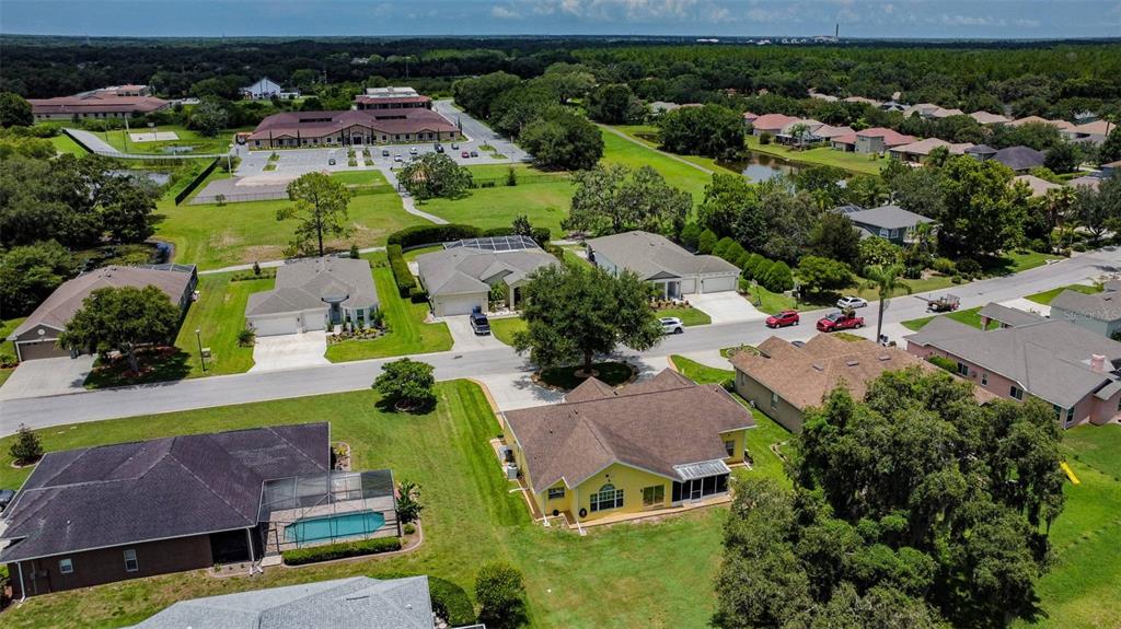 12728 Flamingo Parkway Spring Hill, FL 34610 - Photo 52 of 54 an aerial view of house with a yard