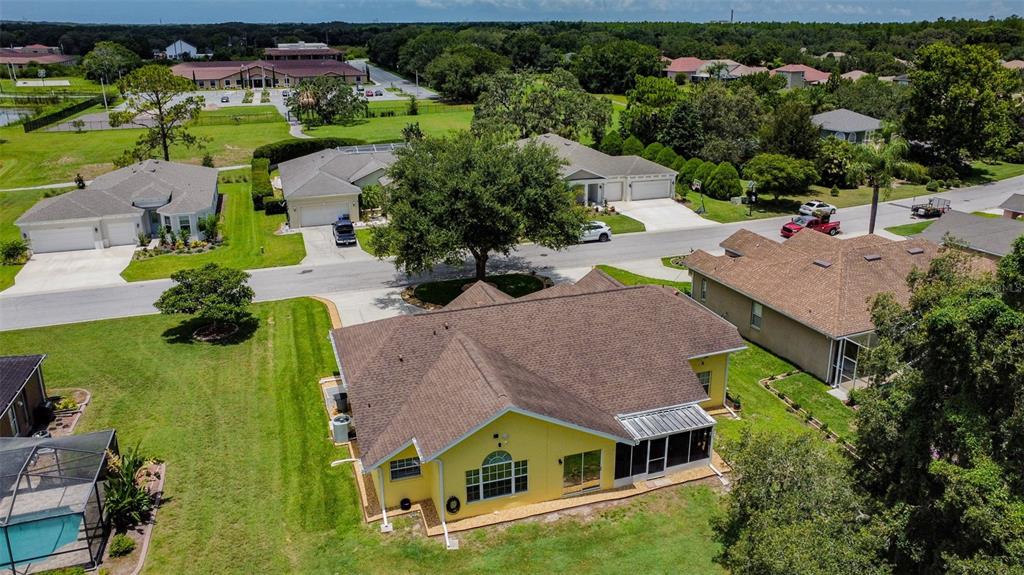 12728 Flamingo Parkway Spring Hill, FL 34610 - Photo 53 of 54 an aerial view of a house with a garden