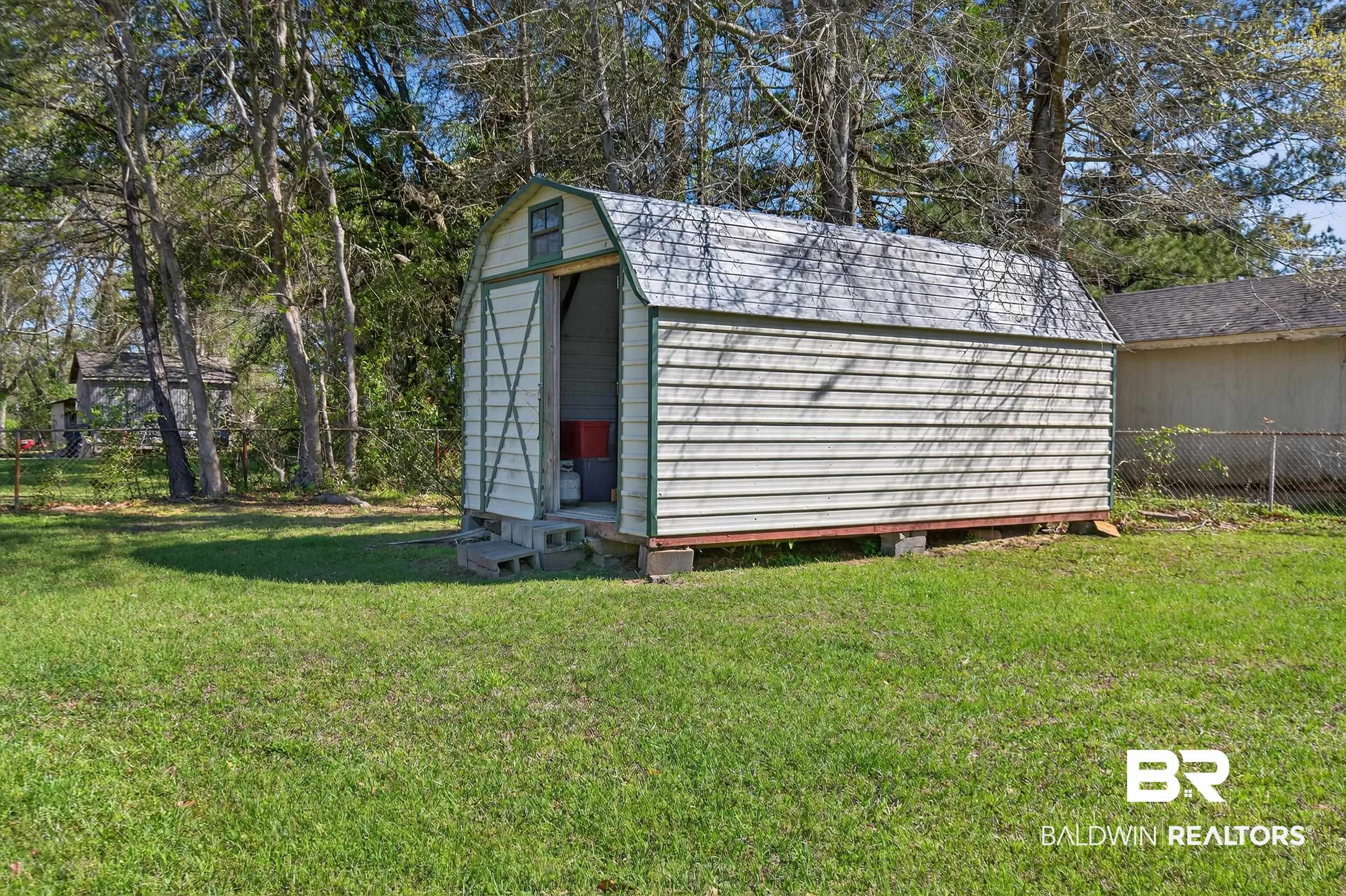 46006 Pecan Lane Bay Minette, AL 36507 - Photo 35 of 40 View of shed with a fenced backyard