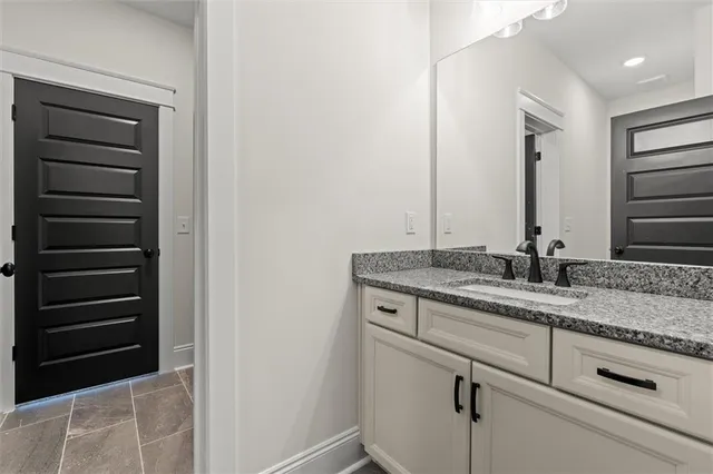 a bathroom with a bathtub a toilet and a shower