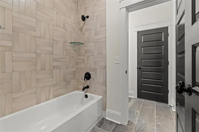 a view of a hallway with windows