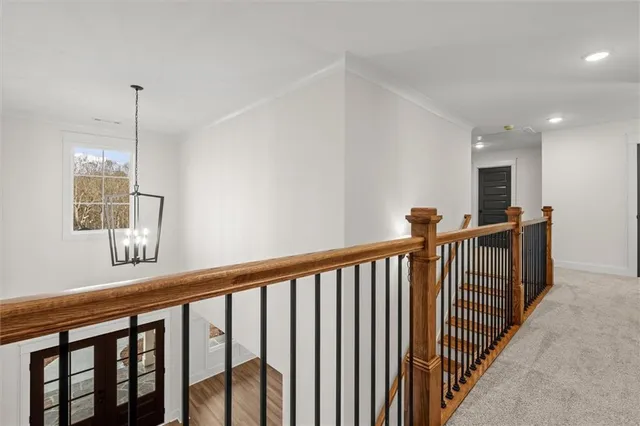 a view of a hallway with workspace