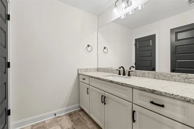 a bathroom with a toilet bathtub and a shower