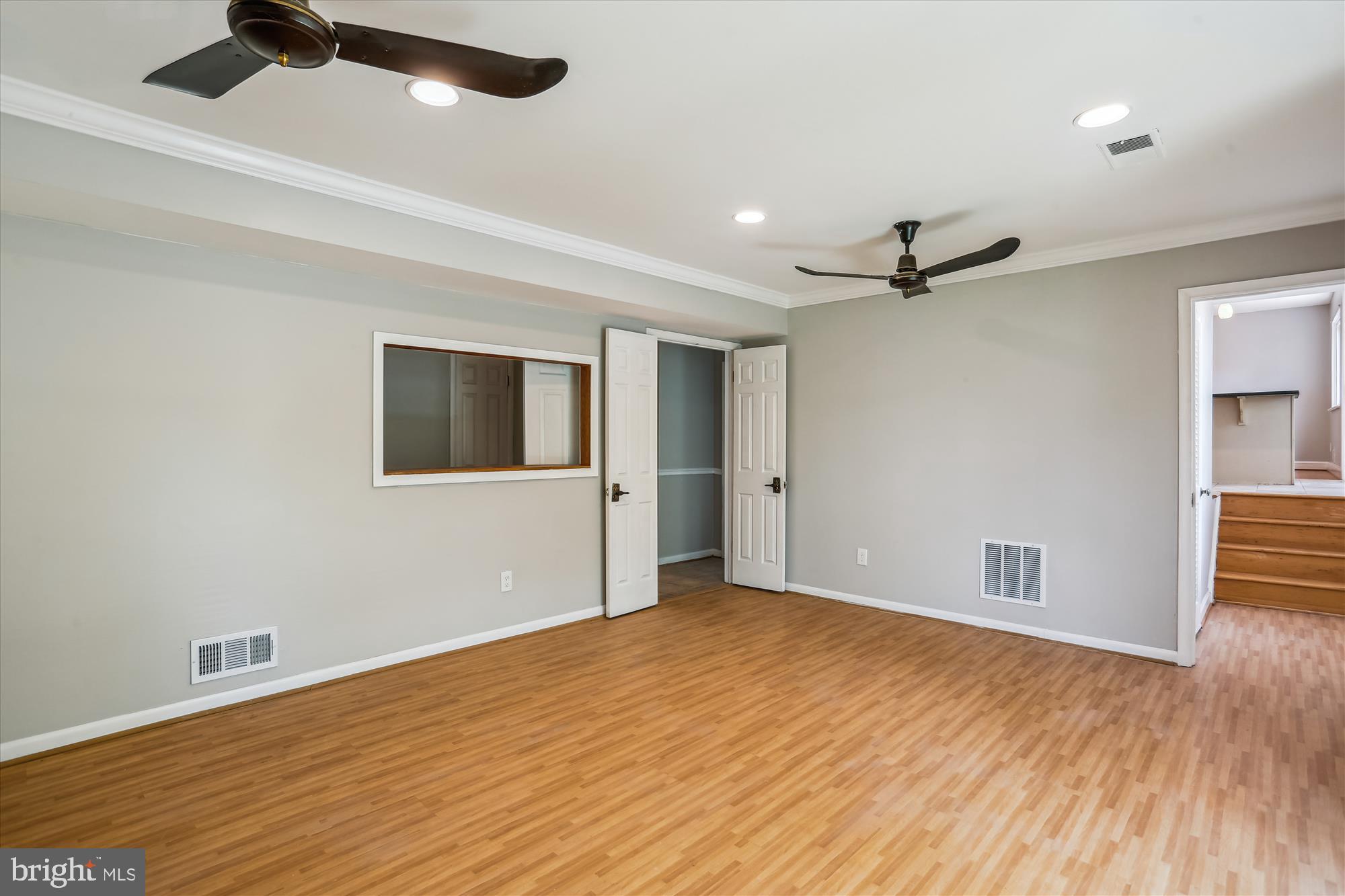 19916 Westerly Avenue Poolesville, MD 20837 - Photo 13 of 34 a view of empty room with wooden floor