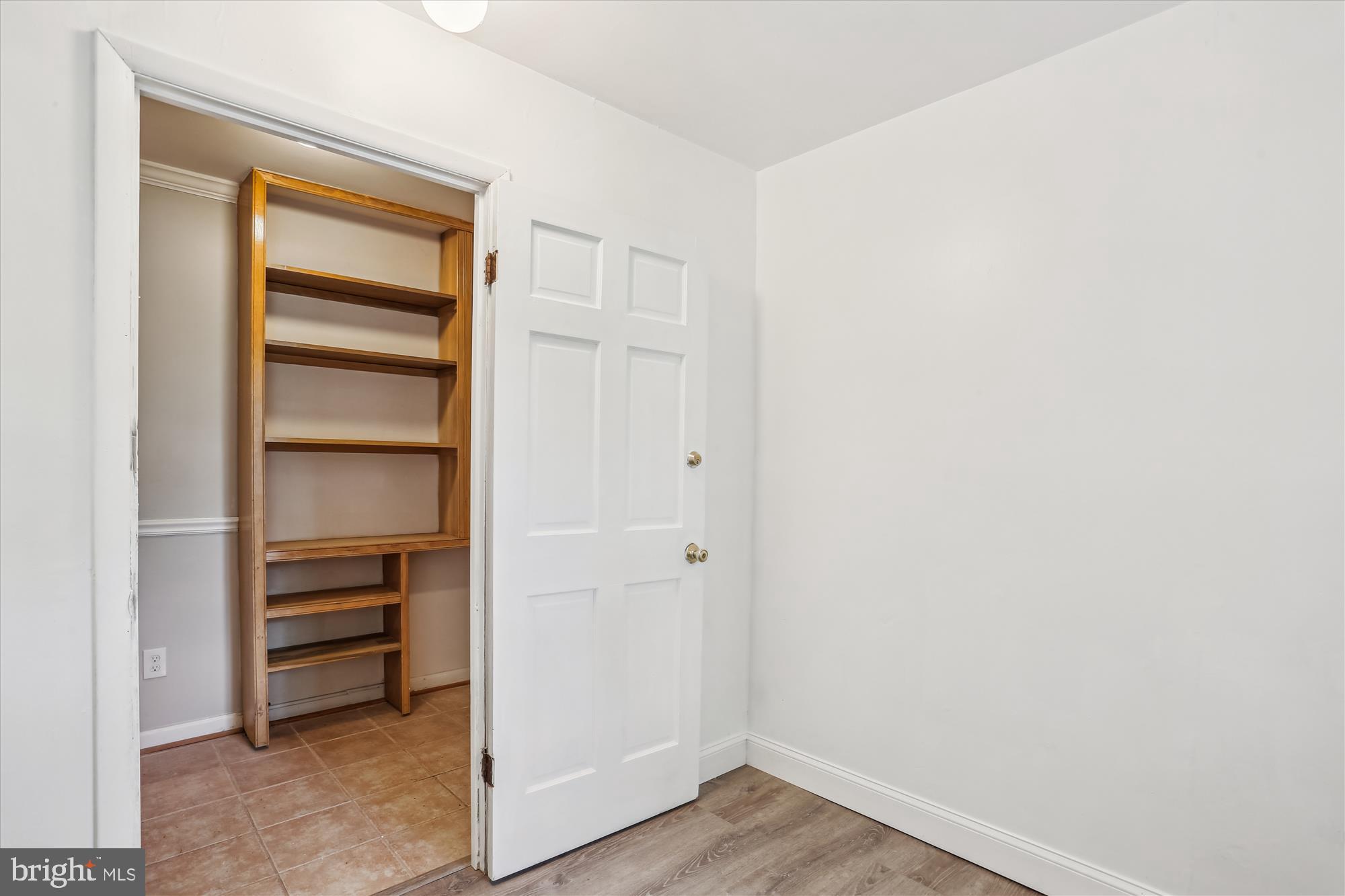 19916 Westerly Avenue Poolesville, MD 20837 - Photo 22 of 34 a view of an empty walk in closet