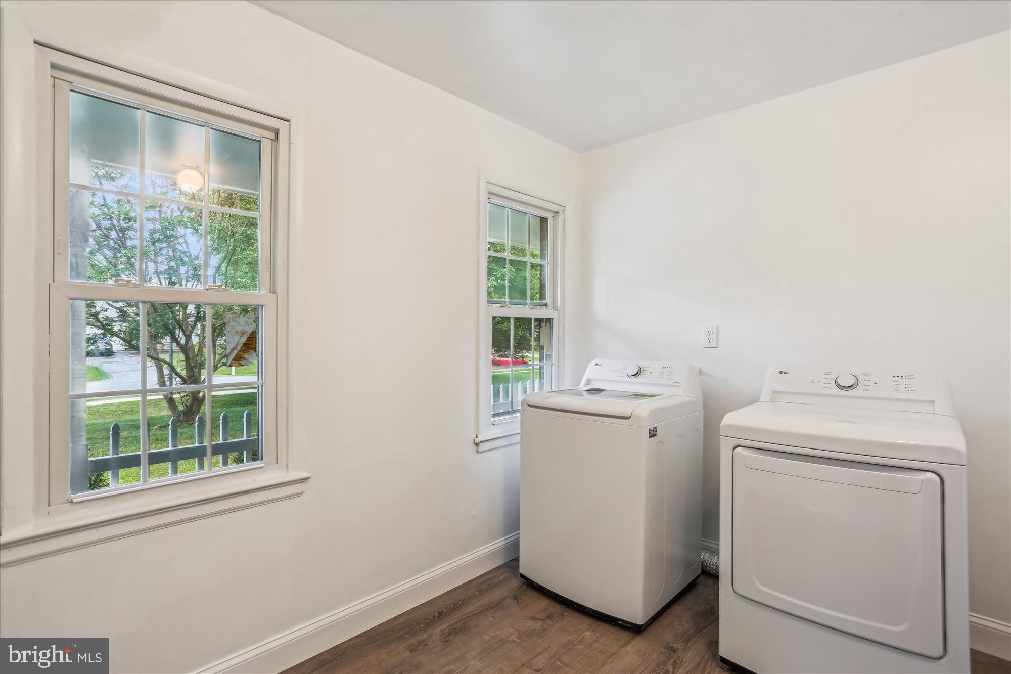 19916 Westerly Avenue Poolesville, MD 20837 - Photo 25 of 34 a utility room with dryer and washer