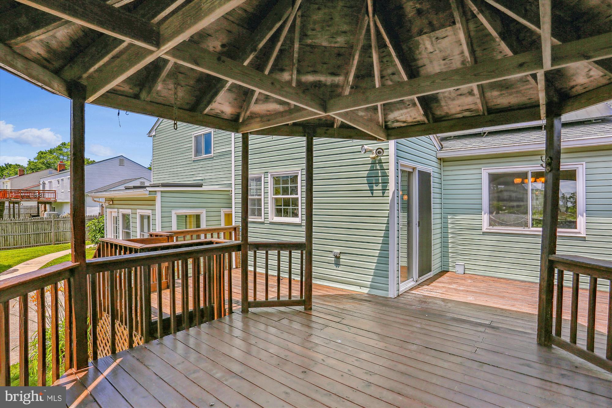 19916 Westerly Avenue Poolesville, MD 20837 - Photo 27 of 34 a view of a balcony with wooden floor