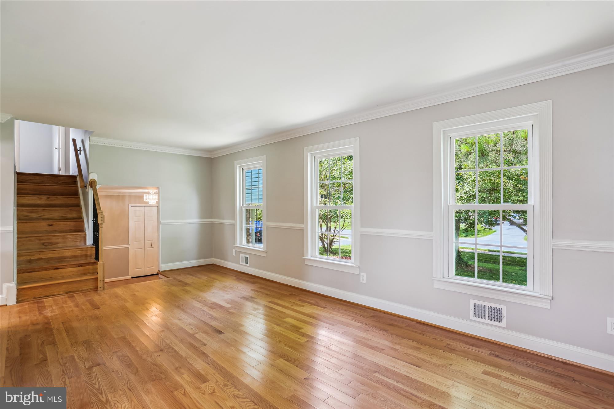 19916 Westerly Avenue Poolesville, MD 20837 - Photo 8 of 34 wooden floor in an empty room with a window