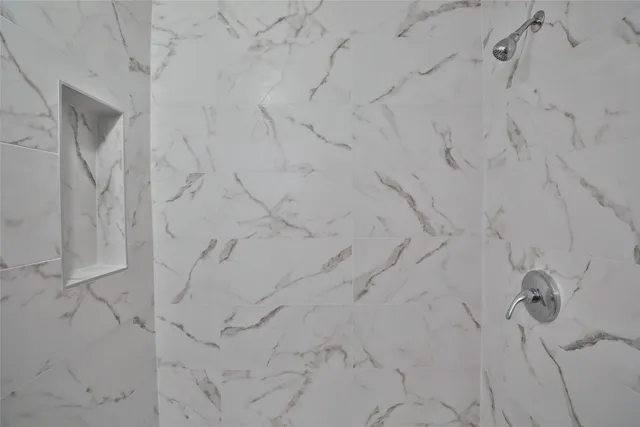 a view of a bathroom from the hallway