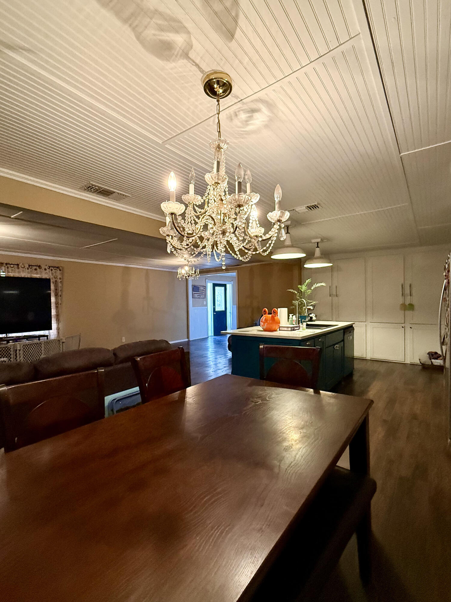 114 North Ave O Post, TX 79356 - Photo 18 of 39 a view of a dining room with furniture and chandelier