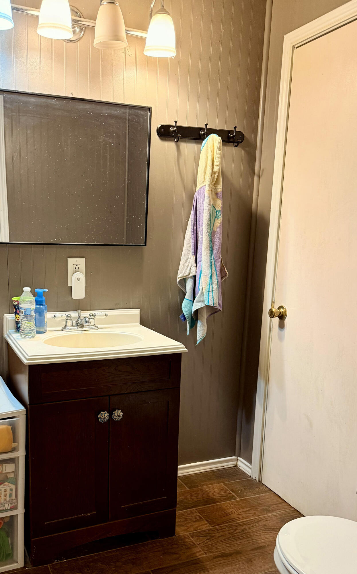 114 North Ave O Post, TX 79356 - Photo 32 of 39 a bathroom with a sink and a mirror