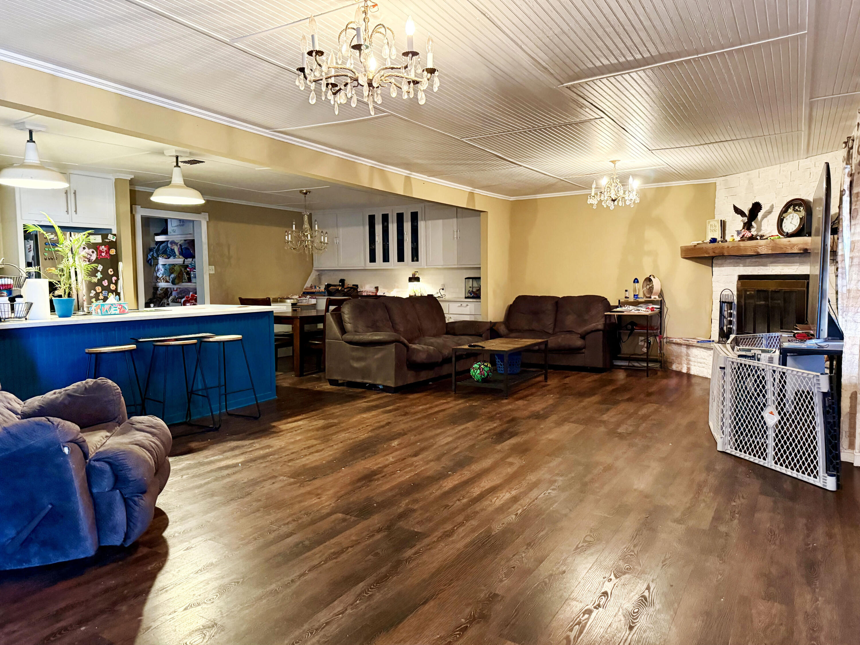 114 North Ave O Post, TX 79356 - Photo 10 of 39 a living room with furniture and a fireplace