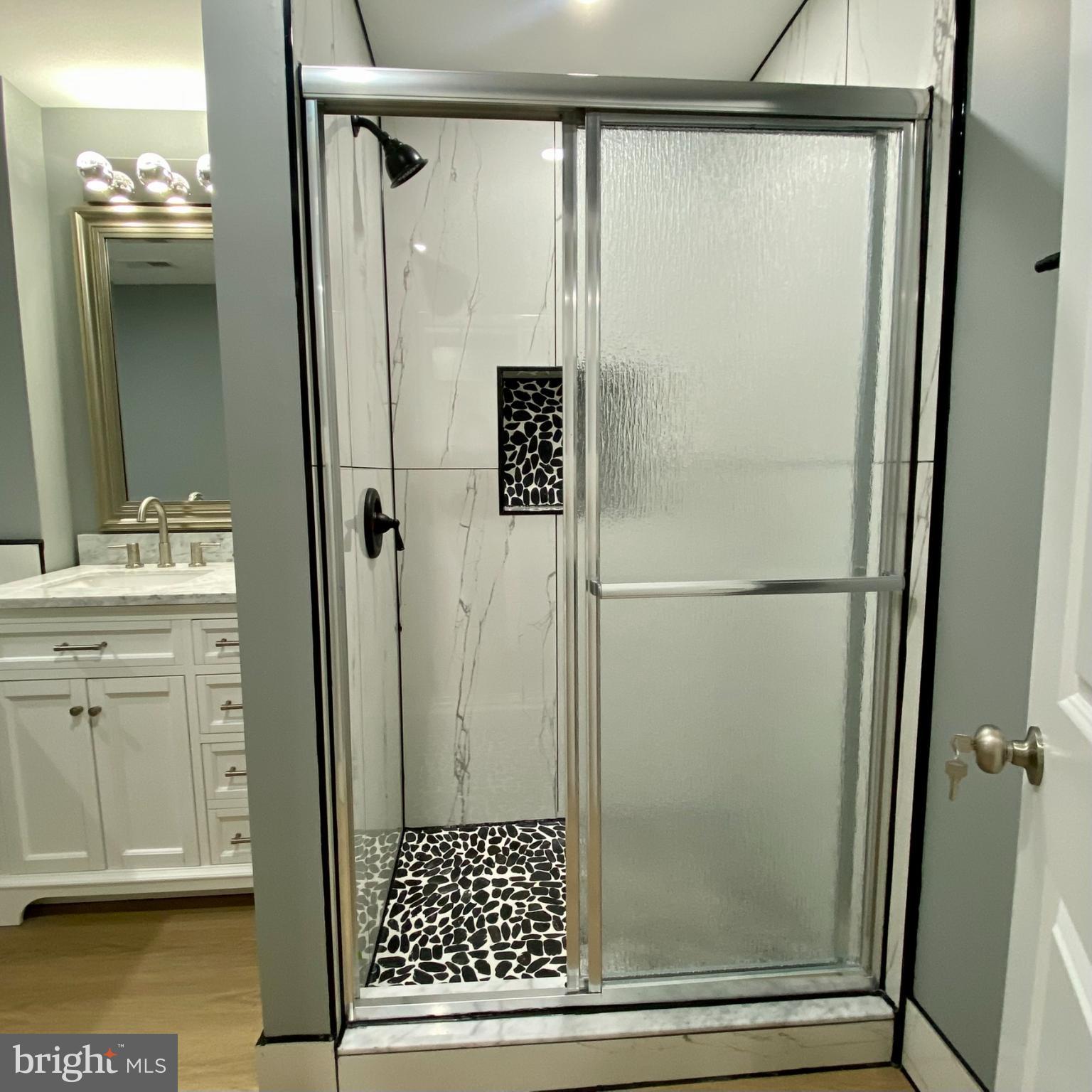 3701 9th Street Northwest, Unit 1 Washington, DC 20010 - Photo 18 of 23 a bathroom with a shower